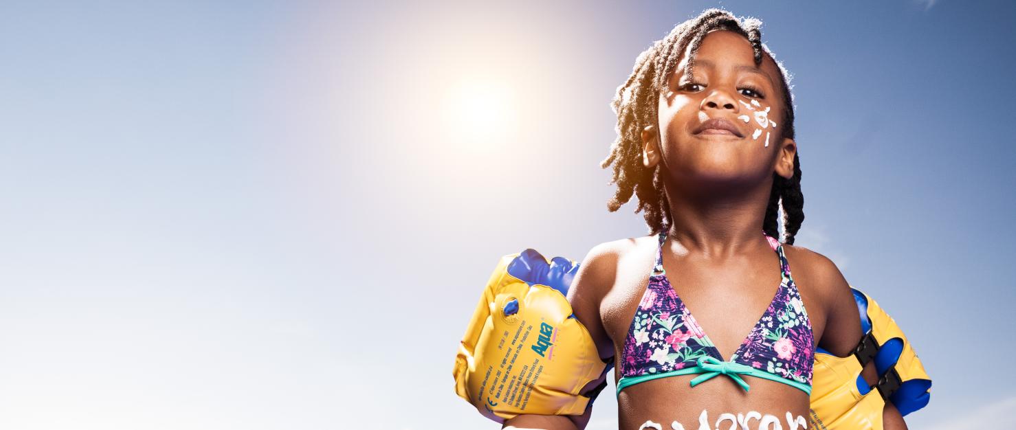 Kind met zonnebrandcreme